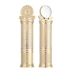 Golden dual-tone eyeshadow stick featuring luxury embossed casing and built-in vanity mirror