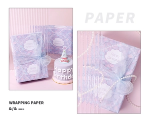 Detail of holographic fish scale wrapping paper for birthdays with elegant pearl decor