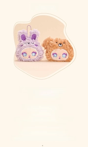 Detail of plush animal keychains featuring purple bunny and brown bear with fine embroidery