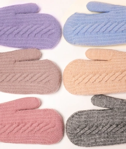 Detailed knit texture display of thick winter cable mittens in six assorted soft colors