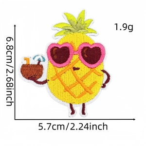Close-up of pineapple embroidery patch with heart sunglasses and dimension markings
