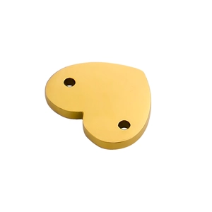 Detailed macro view of heart-shaped stainless steel gold connector for DIY jewelry making
