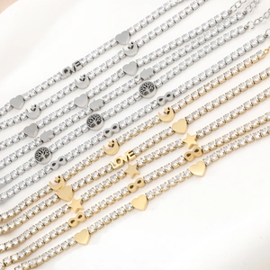 Elegant gold and silver titanium steel tennis bracelets with crystal charm pendants