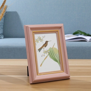 Vintage European style light pink photo frame with gold bead trim and floral art