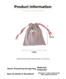 Detailed view of pink striped polyester drawstring bag with 14x15cm size specifications