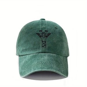 Close-up of giraffe embroidery on vintage washed green cotton canvas baseball cap