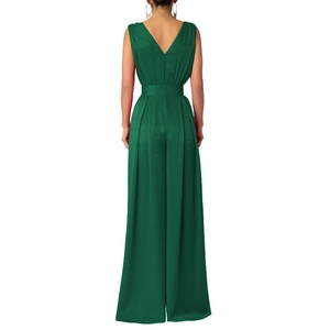 Detail of green sleeveless jumpsuit featuring an elegant back V-neck and silk-like fabric