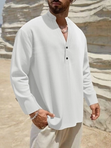 Detail view of white linen-blend Henley shirt with stand collar and buttoned placket