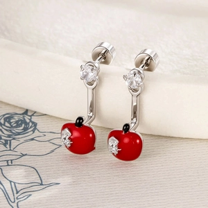 Silver apple cartilage stud earrings with red enamel and sparkling crystal accents