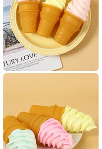 Detailed view of pastel ice cream cone props in pink, yellow, and mint green colors