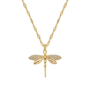 Luxurious gold dragonfly pendant necklace with hollowed wings and pavé white crystals