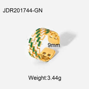 Detail shot of a 9mm 18K gold plated ring featuring green and white checkered enamel