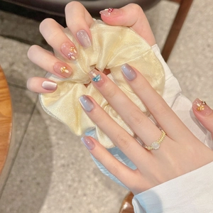 French cat-eye press-on nails with 3D mushrooms, lilac gradient, and pearl accents