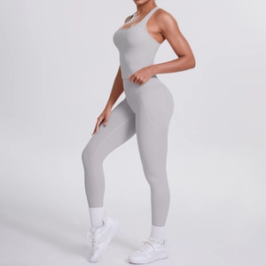 Detail view of high-waist yoga leggings with side pockets in premium grey brushed fabric