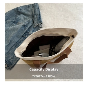 Top view of large canvas tote bag interior showing capacity for daily essentials