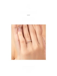 Detail of minimalist S925 silver open ring featuring a delicate pave zircon stone setting