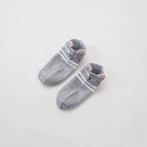Detail view of gray cartoon low-cut sock with 3D animal ears and white stripes
