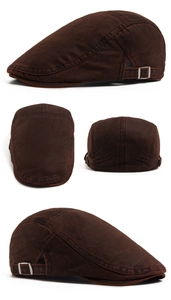 Detail view of washed vintage ivy cap featuring adjustable metal buckles and retro stitching