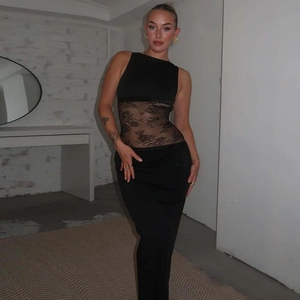 Detail of waist area showing transparent lace patchwork on black sleeveless maxi dress