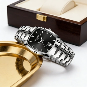 Macro shot of silver quartz watch with black square dial and diamond markers on gold tray