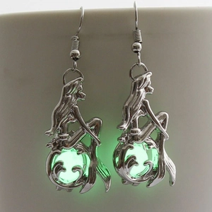 Luminous mermaid drop earrings in silver with glowing green beads for Halloween style