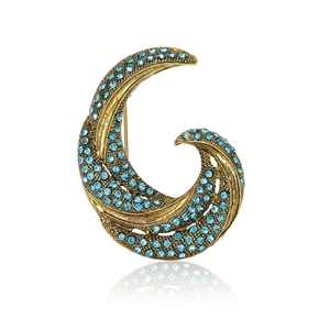 Vintage bronze geometric brooch with light blue rhinestones in a wavy C-shape