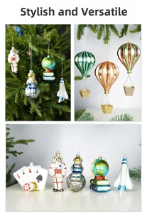Detailed view of colorful glass astronaut and globe ornaments on a Christmas tree