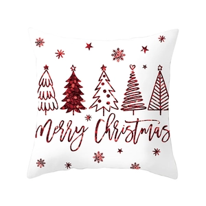 Christmas pillow cover with red sequin trees and Merry Christmas text on white fabric