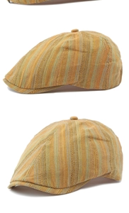 Détail d'une casquette plate vintage montrant la texture tissée et rayures verticales