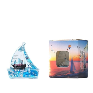 Bouteille dérivante fluide créative avec bateau et boîte cadeau thème coucher de soleil