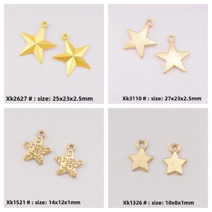 Macro comparison of star charms in various sizes and engraved just for you text
