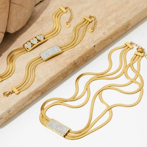 Golden multi-layer snake chain necklace and heart bracelet set with rhinestones