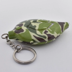Leaf-shaped personal safety alarm in camo green pattern with sturdy metal keychain