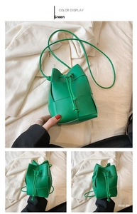 Detailed close-up of green woven leather bucket bag texture and drawstring closure