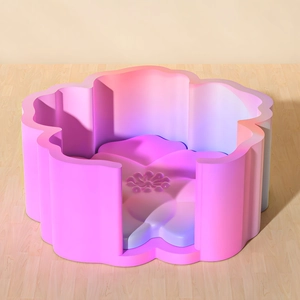 3D render of a flower-shaped pet bed with pink-purple gradient and soft center cushion