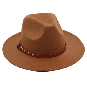 Detailed texture of brown wool felt fedora with leather strap and gold rivet details