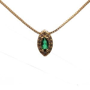 Gold necklace with marquise-cut green gemstone and cubic zirconia halo on box chain