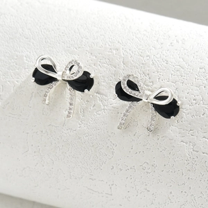 Elegant bow-knot stud earrings with pear-shaped black stones and white zircons