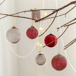 Set of red and grey 6cm ribbed glass Christmas balls hanging on branches with gold strings