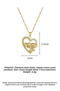 Detail of gold elephant heart pendant with I Love You Forever engraving and zircon stones