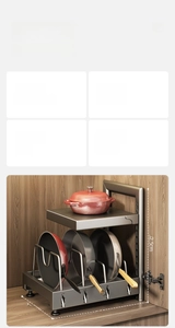Detailed view of a 2-tier adjustable carbon steel pot rack in a kitchen setting