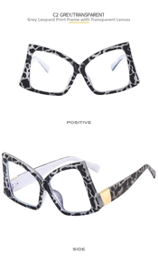 Detailed views of grey tortoiseshell butterfly frames with elegant gold metal accents