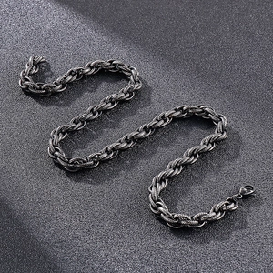 Vintage silver twisted chain necklace with dark textured links in retro industrial style