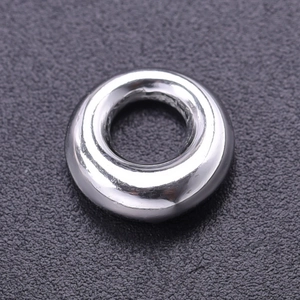 Macro shot of silver 304 stainless steel hollow circular ring charm for jewelry making