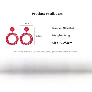Detail showing red resin polka dot earring dimensions and materials with silver needle