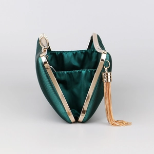 Deep green satin evening clutch bag with gold metal fringe and clasp opening
