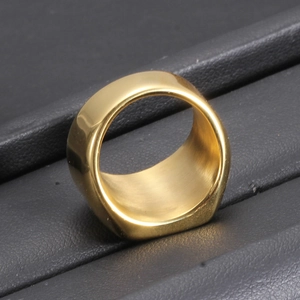 Macro view of wide 18mm gold plated crown ring showing inner band details and thickness