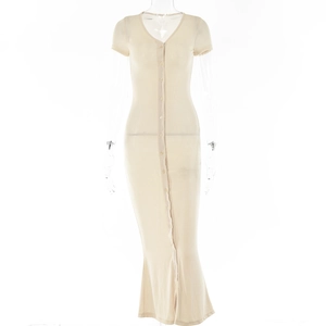 Detailed front view of beige V-neck long dress with elegant buttons on white background