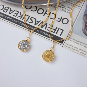 Vintage style gold titanium steel coin necklaces with sunburst and textured pendants