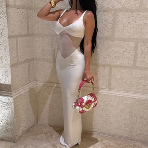 Close-up of sexy V-neck bodycon dress featuring sheer mesh waist stitching in white